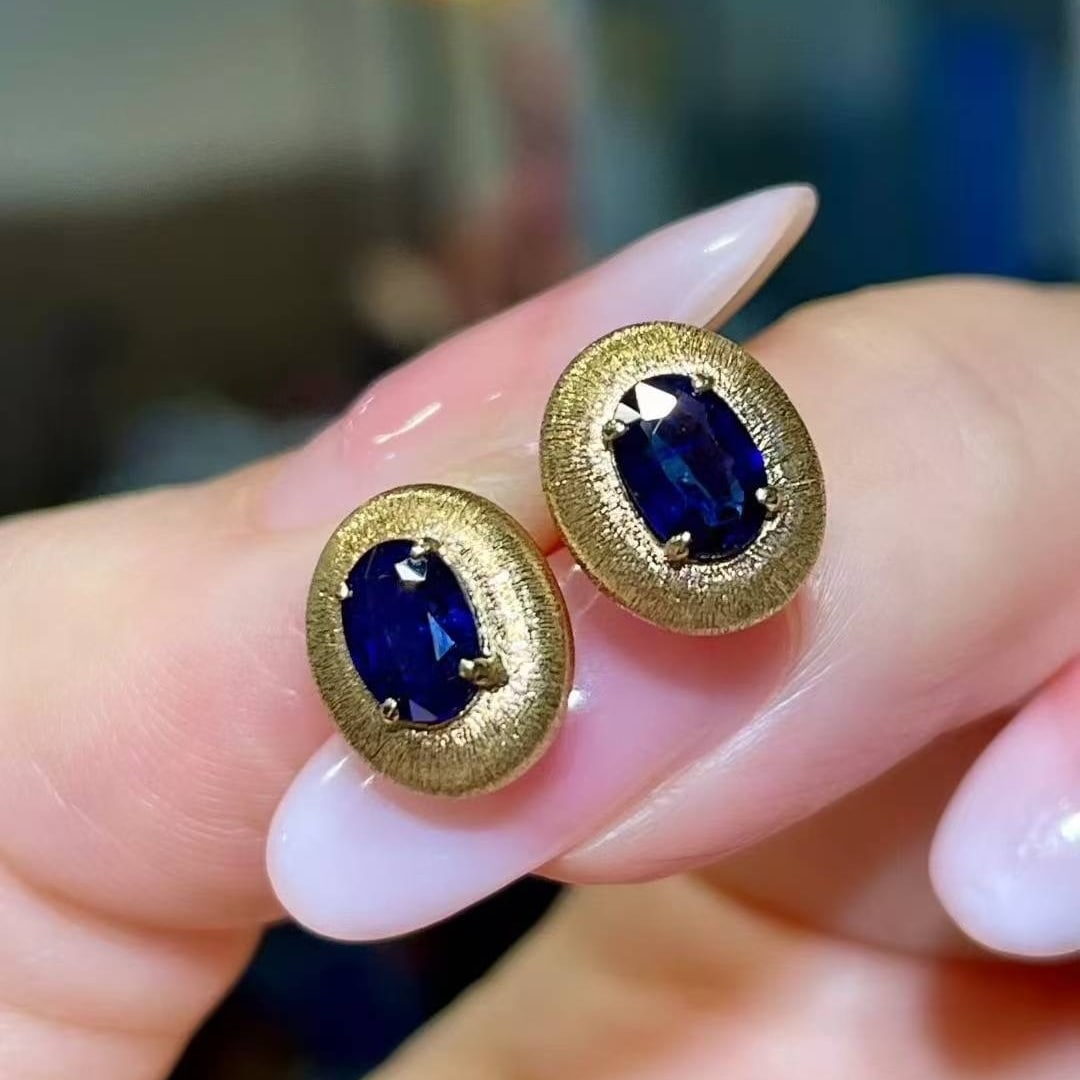 14k Gold 1.13 Ct Natural Sapphire Earrings: Ref:231033183 // gold content:14k gold // main gemstone:sapphire // shape:oval // carat weight:1. 13ct // color:blue // treatment:natural // Condition: New Low Estimate: 2600.00 High Estimate: 4000.00