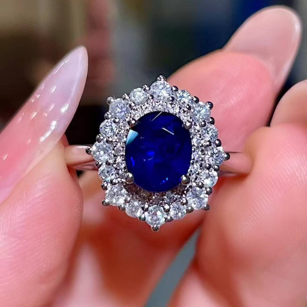 14k Gold 1.90 Ctw Natural Sapphire & Diamond Ring: Ref:231033193 // gold content:14k gold // ring size:7. 25us // // main gemstone:sapphire // shape:oval // carat weight:1. 34ct // color:blue // treatment:natural // // adjacent gemstone 2 : diamond