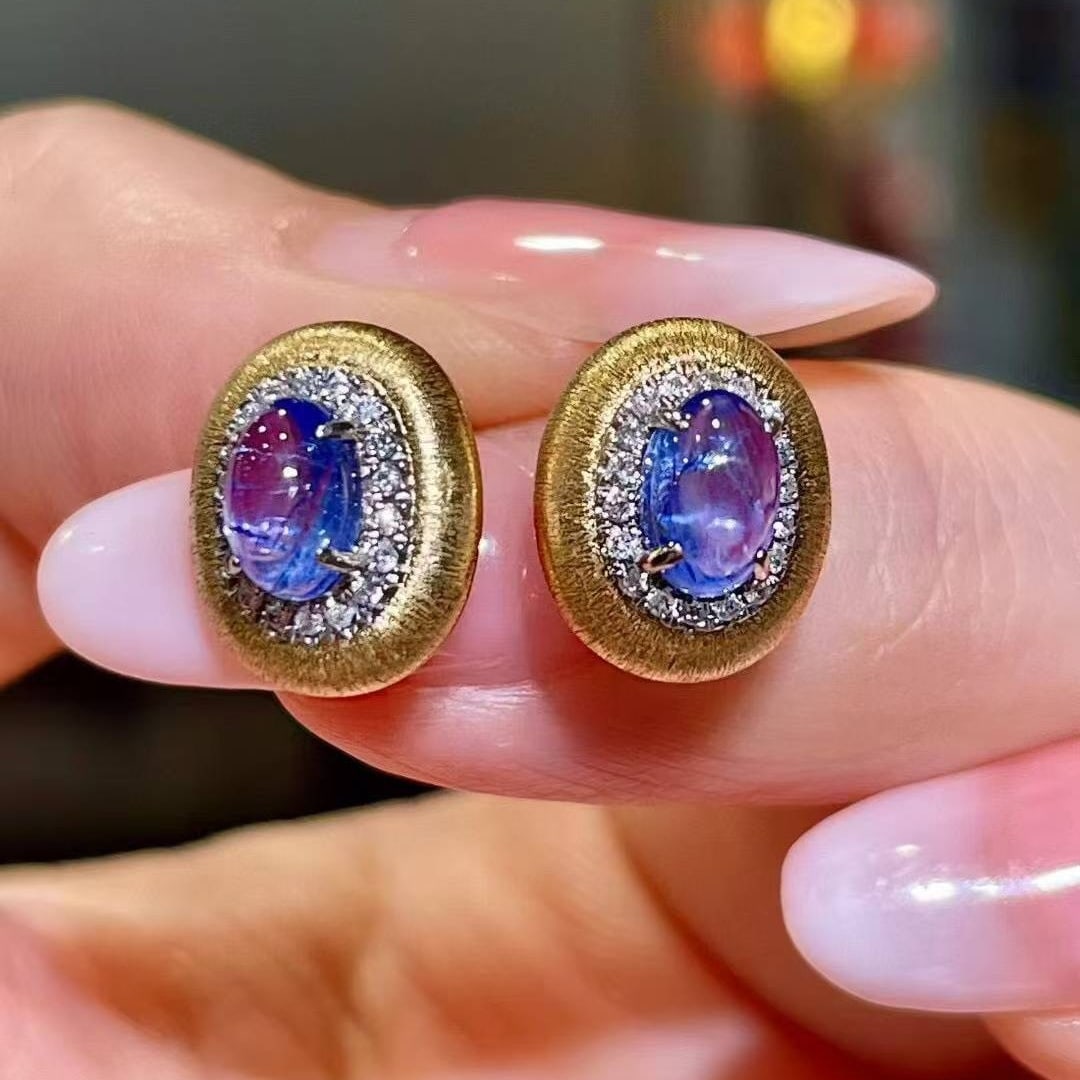 14k Gold 1.79 Ctw Natural Sapphire & Diamond Earrings: Ref:231033220 // gold content:14k gold // main gemstone:sapphire // shape:oval // carat weight:1. 65ct // color:blue // treatment:natural // // adjacent gemstone 2 : diamond // shape:round // carat we