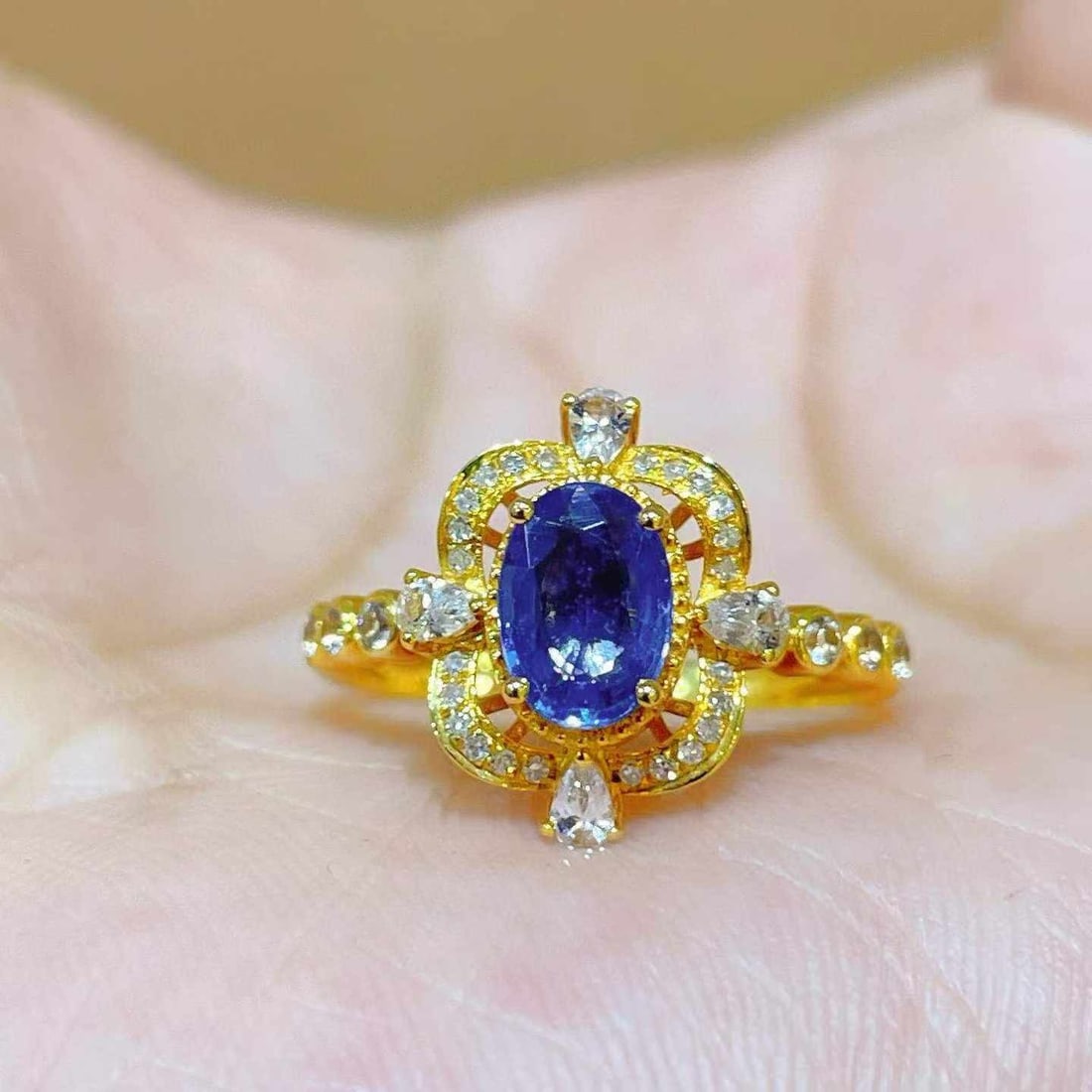 14k Gold 0.90 Ctw Natural Sapphire & Diamond Ring: Ref:231033223 // gold content:14k gold // ring size:7. 25us // // main gemstone:sapphire // shape:oval // carat weight:0. 84ct // color:blue // treatment:natural // // adjacent gemstone 2 : diamond
