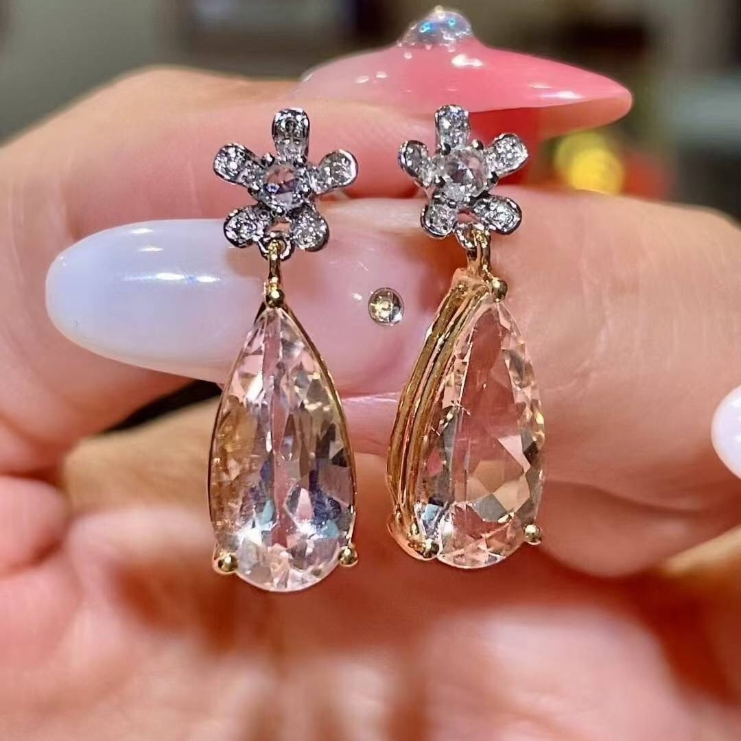 14k Gold 4.88 Ct Natural Morganite & Diamond Earrings: Ref:231033224 // gold content:14k gold // main gemstone:morganite // shape:pear // carat weight:4. 88ct // color:pink // treatment:natural // // adjacent gemstone 2 : diamond // shape:round // clarity