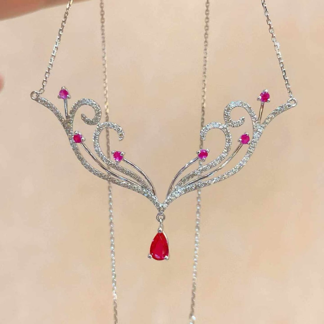 14k Gold 1.04 Ctw Natural Ruby & Diamond Necklace: Ref:231033226 // gold content:14k gold // main gemstone:ruby // shape:pear // carat weight:0. 36ct // color:red // treatment:natural // // adjacent gemstone 2 : diamond // shape:round // carat