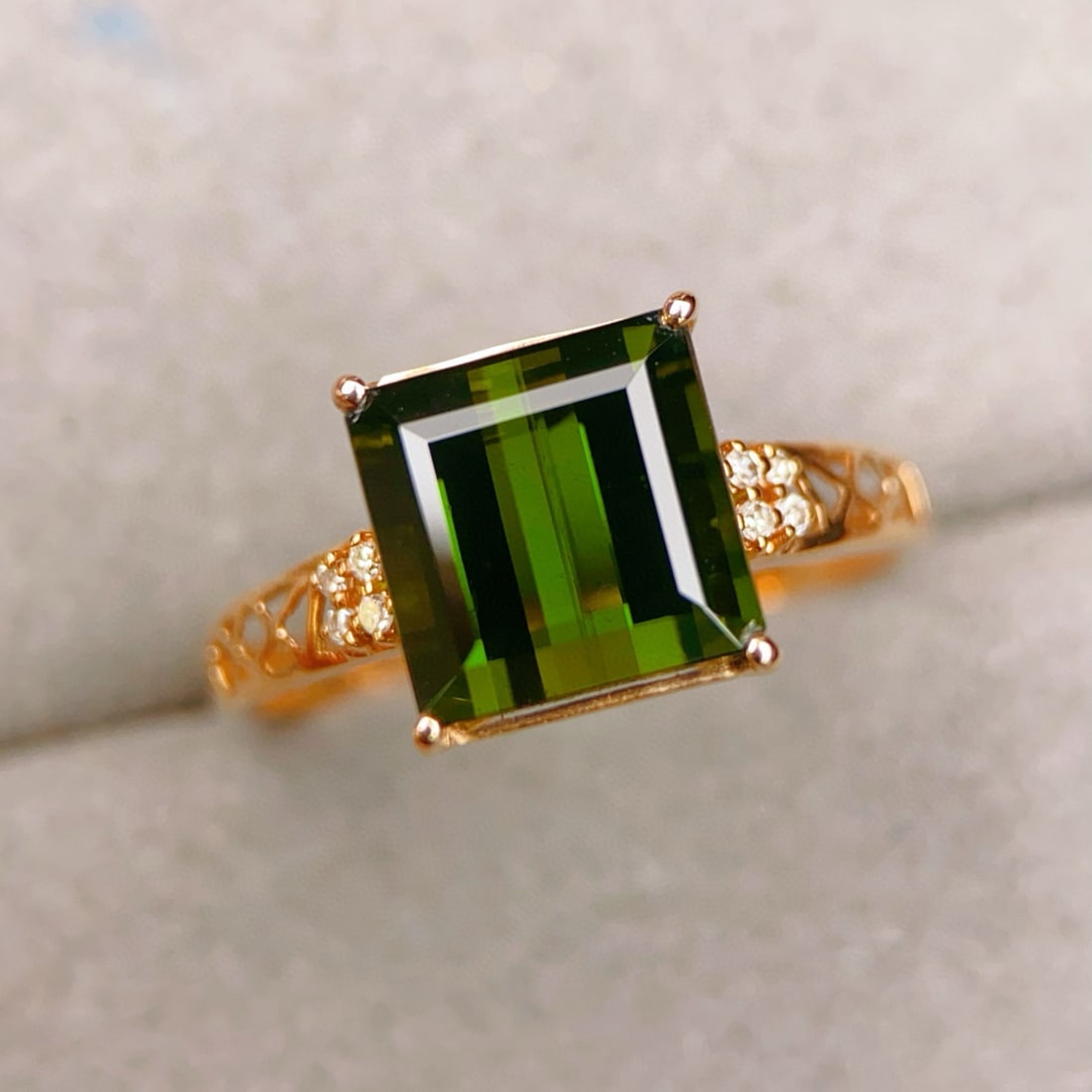 14k Gold 3.29 Ctw Natural Tourmaline & Diamond Ring: Ref:231033241 // gold content:14k gold // ring size:7. 25us // // main gemstone:tourmaline // shape:octagonal // carat weight:3. 25ct // color:green // treatment:natural // // adjacent gemstone 2 :