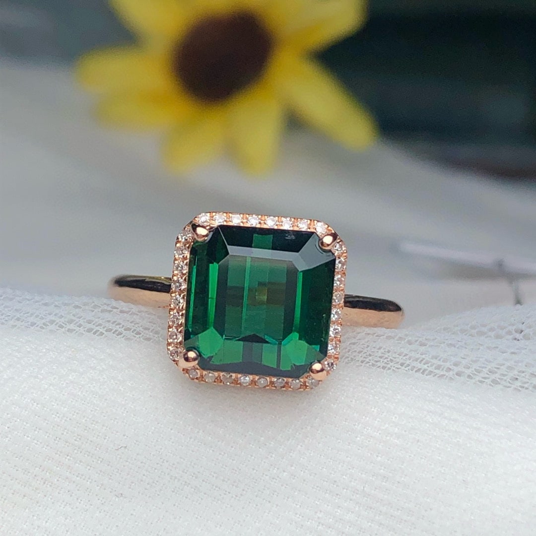 14k Gold 4.5 Ct Natural Tourmaline & Diamond Ring: Ref:231033249 // gold content:14k gold // ring size:7. 25us // // main gemstone:tourmaline // shape:octagonal // carat weight:4. 5ct // color:green // treatment:natural // // adjacent gemstone 2 :