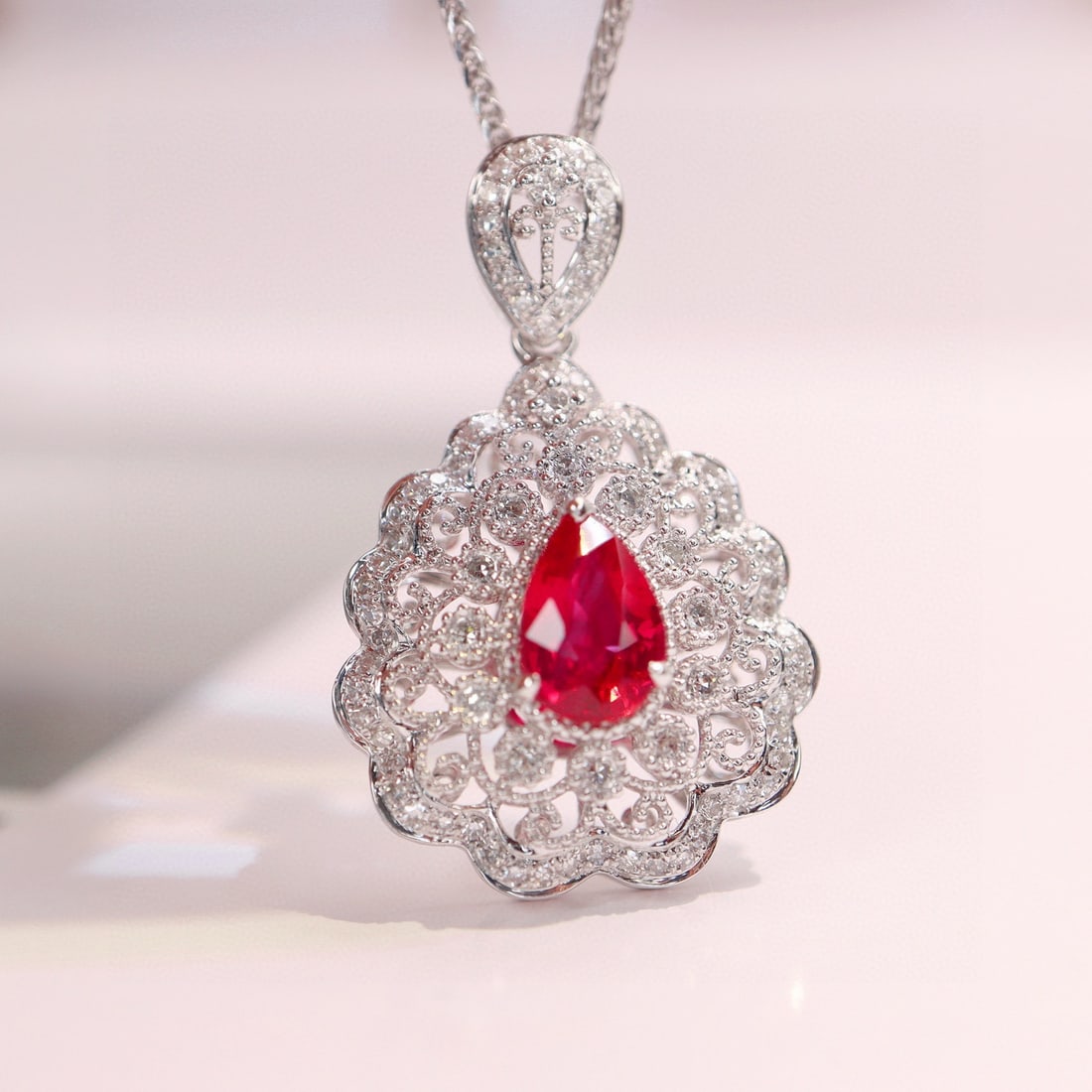 14k Gold 1.09 Ctw Natural Ruby & Diamond Pendant( Without Chain ): Ref:231033253 // gold content:14k gold // main gemstone:ruby // shape:pear // carat weight:0. 8ct // color:red // treatment:natural // // adjacent gemstone 2 : diamond // shape:round // carat
