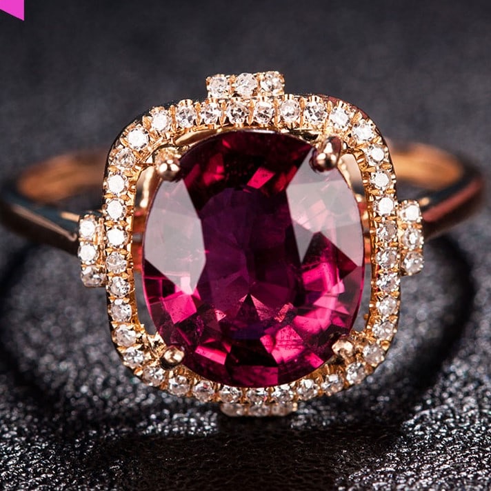 14k Gold 2.67 Ct Natural Tourmaline & Diamond Ring: Ref:231034003 // gold content:14k gold // ring size:7. 25us // // main gemstone:tourmaline // shape:oval // carat weight:2. 67ct // color:red // treatment:natural // // adjacent gemstone 2 : diamond