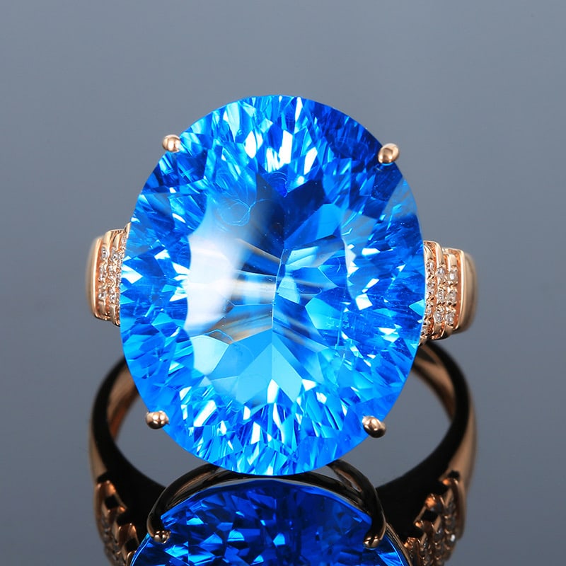 14k Gold 17.43 Ct Natural Topaz & Diamond Ring: Ref:231034046 // gold content:14k gold // ring size:7. 25us // // main gemstone:topaz // shape:oval // carat weight:17. 43ct // color:blue // treatment:natural // // adjacent gemstone 2 : diamond // s
