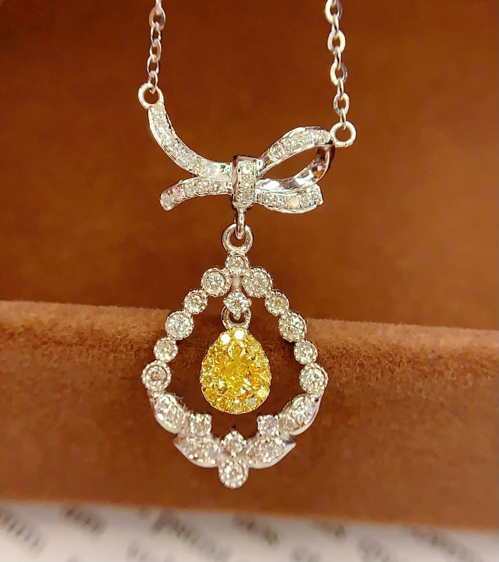 14k Gold 0.25 Ct Natural Yellow Diamond & Diamond Necklace: Ref:231034047 // gold content:14k gold // main gemstone:yellow diamond // shape:pear // carat weight:0. 25ct // color:yellow // treatment:natural // // adjacent gemstone 2 : diamond // number of stone