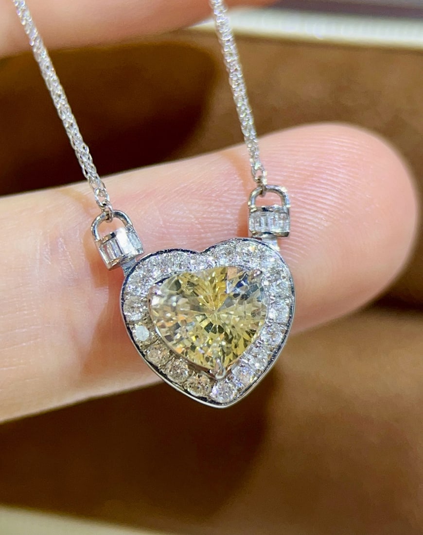 14k Gold 2.32 Ctw Natural Sapphire & Diamond Necklace: Ref:231034049 // gold content:14k gold // main gemstone:sapphire // shape:heart // carat weight:2. 02ct // color:yellow // treatment:natural // // adjacent gemstone 2 : diamond // shape:multiply //