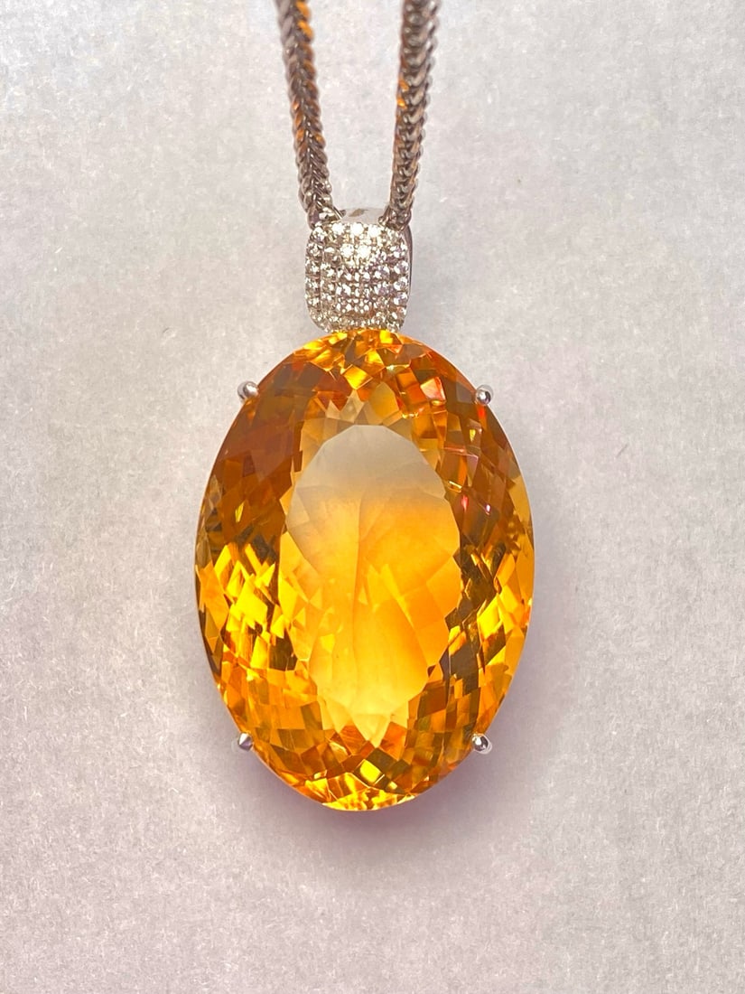 14k Gold 43.45 Ct Natural Citrine & Zircon Pendant( Without Chain ): Ref:231034057 // gold content:14k gold // main gemstone:citrine // shape:oval // carat weight:43. 45ct // color:yellow // treatment:natural // // adjacent gemstone 2 : zircon // number of stones:40