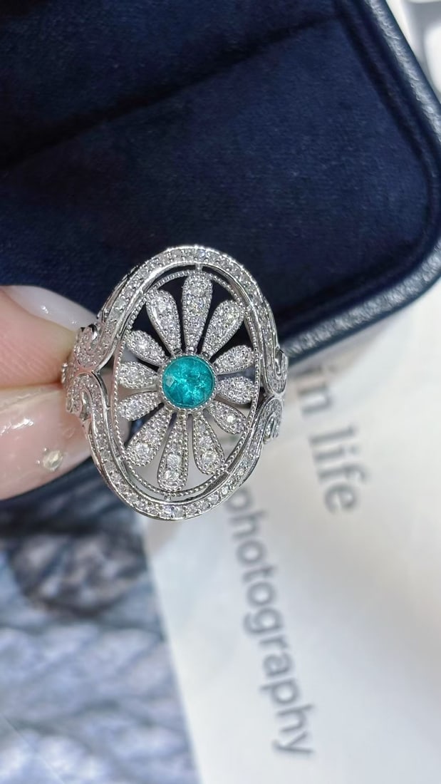 14k Gold 0.3 Ct Natural Paraiba Tourmaline & Diamond Ring: Ref:231034109 // gold content:14k gold // ring size:7. 25us // // main gemstone:paraiba tourmaline // shape:round // carat weight:0. 3ct // color:blue // treatment:natural // cut grade:g // //