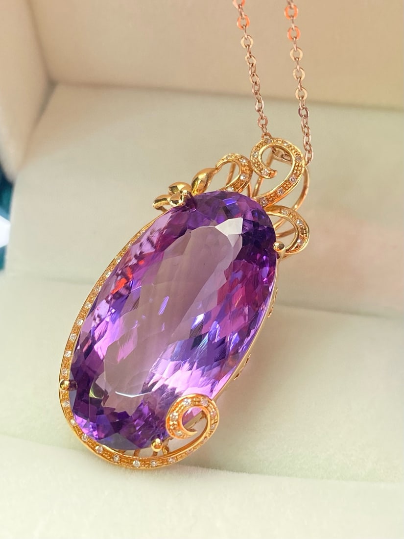 14k Gold 33.3 Ct Natural Amethyst & Diamond Pendant( Without Chain ): Ref:231034115 // gold content:14k gold // main gemstone:amethyst // shape:oval // carat weight:33. 3ct // color:purple // treatment:natural // // adjacent gemstone 2 : diamond // number of stones:44