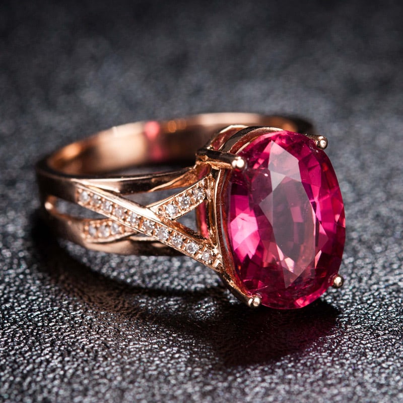 14k Gold 4.5 Ct Natural Tourmaline & Diamond Ring: Ref:231034142 // gold content:14k gold // ring size:7. 25us // // main gemstone:tourmaline // shape:oval // carat weight:4. 5ct // color:red // treatment:natural // // adjacent gemstone 2 : diamond