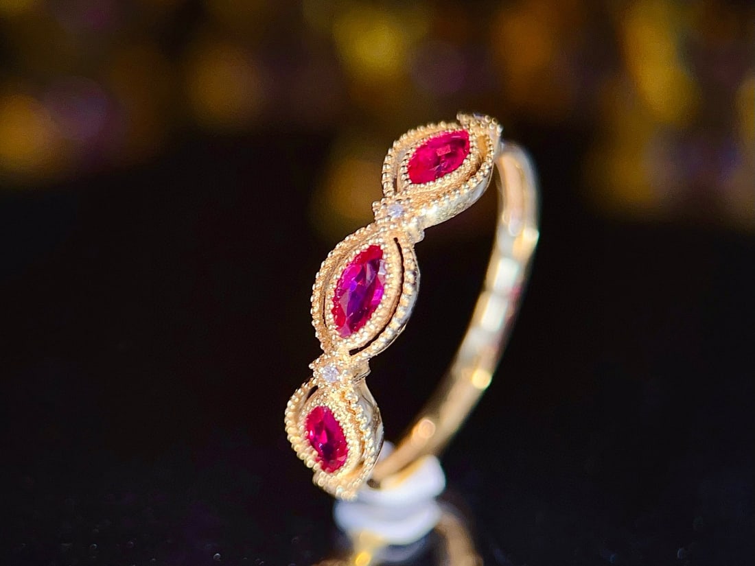 14k Gold 0.55 Ct Natural Ruby & Diamond Ring: Ref:231034168 // gold content:14k gold // ring size:7. 25us // // main gemstone:ruby // shape:marquise // carat weight:0. 55ct // color:red // treatment:natural // // adjacent gemstone 2 : diamond //