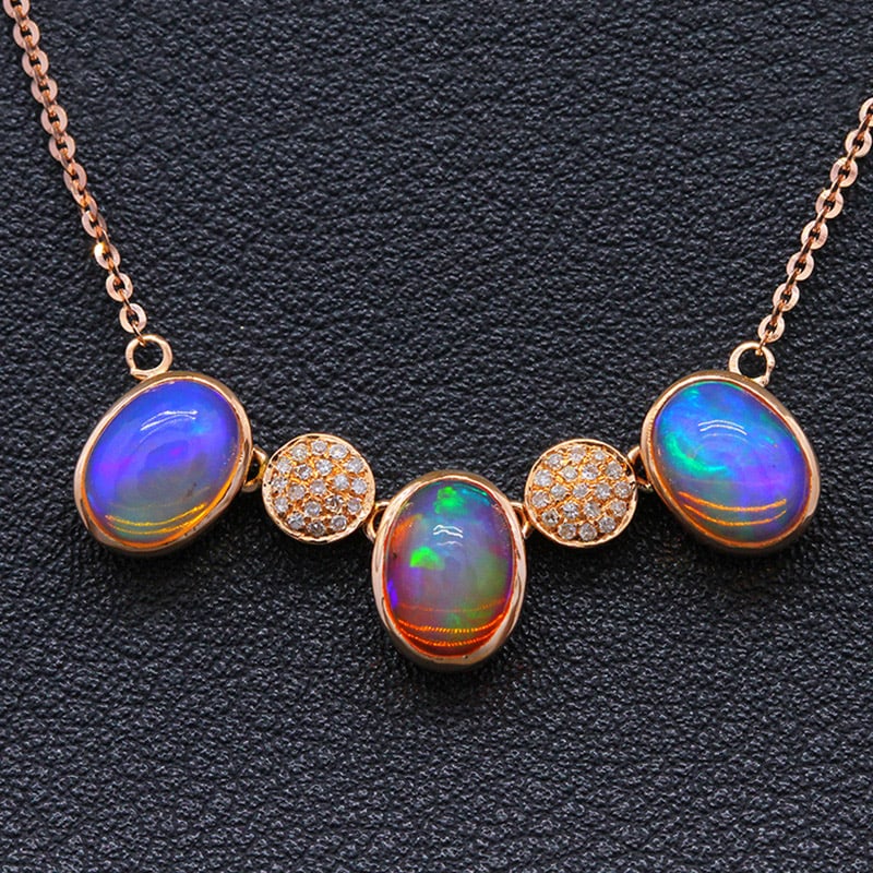 14k Gold 4.11 Ctw Natural Opal & Diamond Necklace: Ref:231034172 // gold content:14k gold // main gemstone:opal // shape:oval // carat weight:4. 00ct // color:color // treatment:natural // // adjacent gemstone 2 : diamond // shape:round // carat weigh