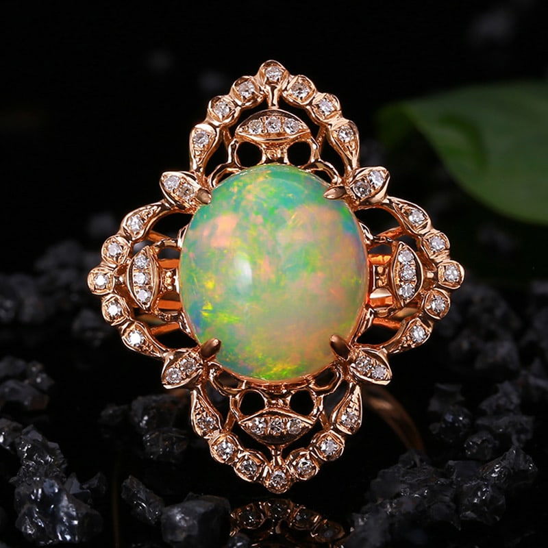 14k Gold 4.78 Ctw Natural Opal & Diamond Ring: Ref:231034173 // gold content:14k gold // ring size:7. 25us // // main gemstone:opal // shape:oval // carat weight:4. 56ct // color:color // treatment:natural // // adjacent gemstone 2 : diamond // sh