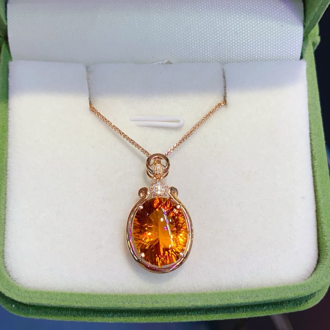 14k Gold 6.2 Ct Natural Citrine & Diamond Pendant( Without Chain ): Ref:231034187 // gold content:14k gold // main gemstone:citrine // shape:oval // carat weight:6. 2ct // color:yellow // treatment:natural // // adjacent gemstone 2 : diamond // number of stones:20 //