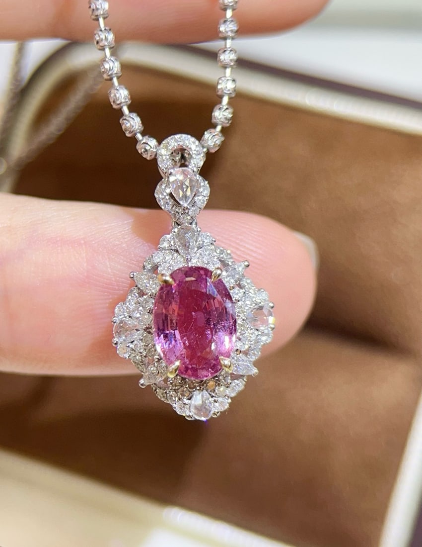 14k Gold 2.59 Ctw Natural Padparadscha Sapphire & Diamond Pendant( Without Chain ): Ref:231034205 // gold content:14k gold // main gemstone:padparadscha sapphire // shape:oval // carat weight:2. 10ct // color:orangish pink // treatment:natural // // adjacent gemstone 2 : diamond // s