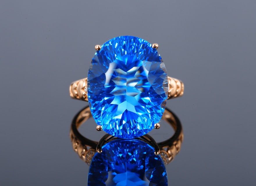 14k Gold 17.15 Ctw Natural Topaz & Diamond Ring: Ref:231034212 // gold content:14k gold // ring size:7. 25us // // main gemstone:topaz // shape:oval // carat weight:17. 09ct // color:blue // treatment:natural // // adjacent gemstone 2 : diamond //