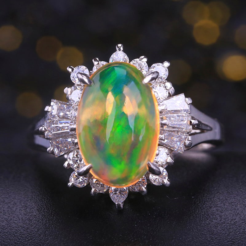 14k Gold 3.15 Ctw Natural Opal & Diamond Ring: Ref:231034242 // gold content:14k gold // ring size:7. 25us // // main gemstone:opal // shape:oval // carat weight:2. 42ct // color:color // treatment:natural // // adjacent gemstone 2 : diamond //