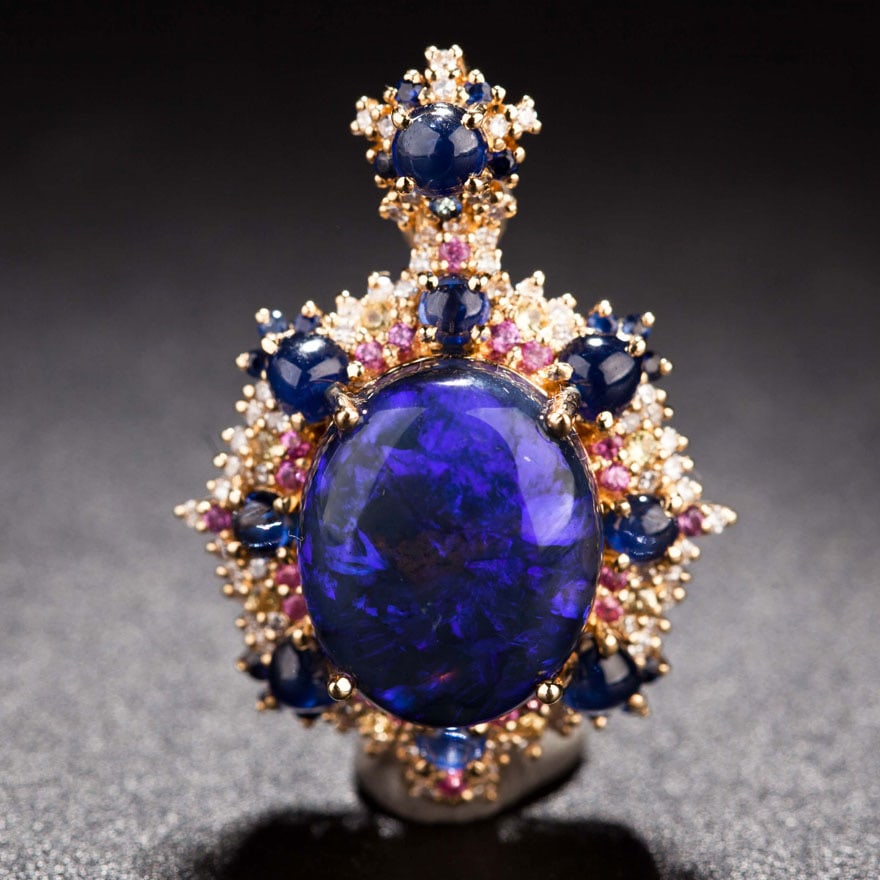 14k Gold 5.5 Ct Natural Opal & Sapphire & Ruby Pendant( Without Chain ): Ref:231034243 // gold content:14k gold // main gemstone:opal // shape:oval // carat weight:5. 5ct // color:blue // treatment:natural // // adjacent gemstone 2 : sapphire // shape:round // color:color