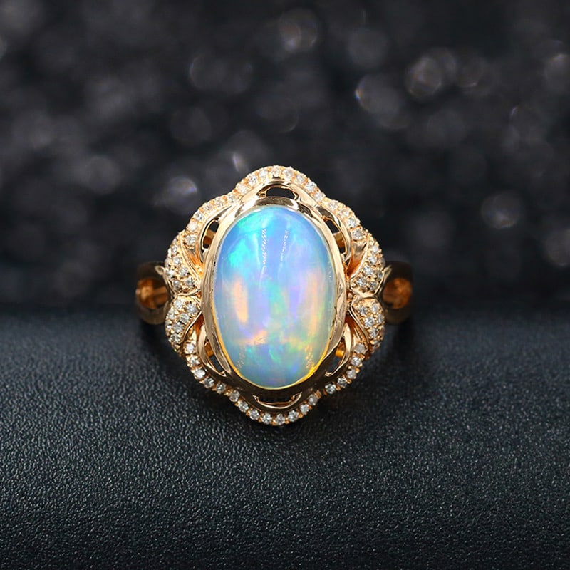 14k Gold 4.44 Ctw Natural Opal & Diamond Ring: Ref:231034248 // gold content:14k gold // ring size:7. 25us // // main gemstone:opal // shape:oval // carat weight:4. 25ct // color:color // treatment:natural // // adjacent gemstone 2 : diamond //
