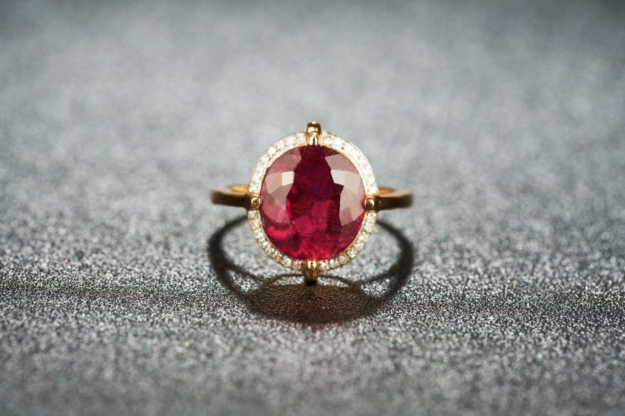 14k Gold 5.55 Ct Natural Tourmaline & Diamond Ring: Ref:231034249 // gold content:14k gold // ring size:7. 25us // // main gemstone:tourmaline // shape:oval // carat weight:5. 55ct // color:red // treatment:natural // // adjacent gemstone 2 : diamond