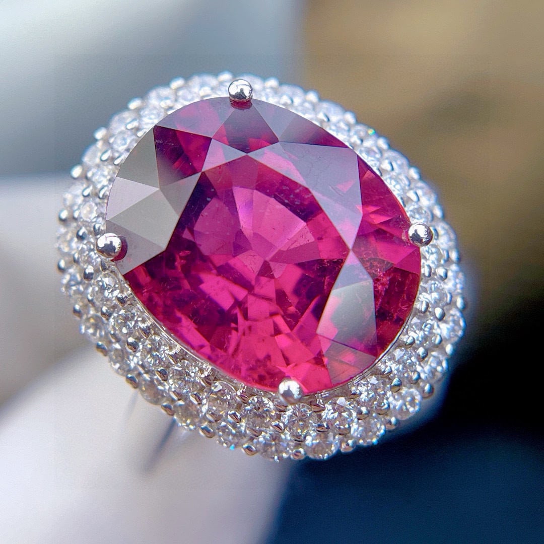 14k Gold 8.85 Ct Natural Tourmaline & Diamond Ring: Ref:231034253 // gold content:14k gold // ring size:7. 25us // // main gemstone:tourmaline // shape:oval // carat weight:8. 85ct // color:red // treatment:natural // // adjacent gemstone 2 : diamond