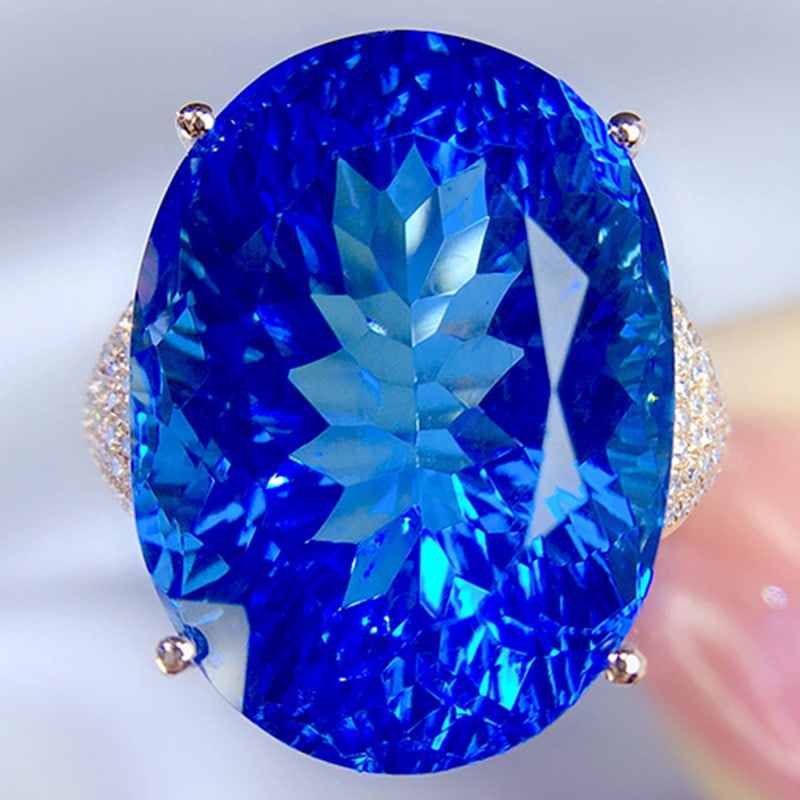 14k Gold 30.21 Ctw Natural Topaz & Diamond Ring: Ref:231034260 // gold content:14k gold // ring size:7. 25us // // main gemstone:topaz // shape:oval // carat weight:30ct // color:blue // treatment:natural // // adjacent gemstone 2 : diamond //