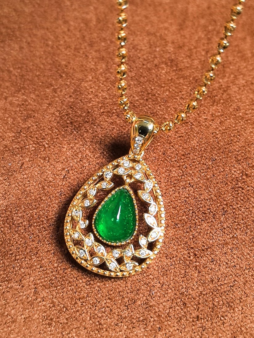 14k Gold 0.92 Ct Vivid Green Natural Emerald & Diamond Pendant( Without Chain ): Ref:231034276 // gold content:14k gold // main gemstone:emerald // shape:pear // carat weight:0. 92ct // color:vivid green // treatment:natural // // adjacent gemstone 2 : diamond // shape:round //