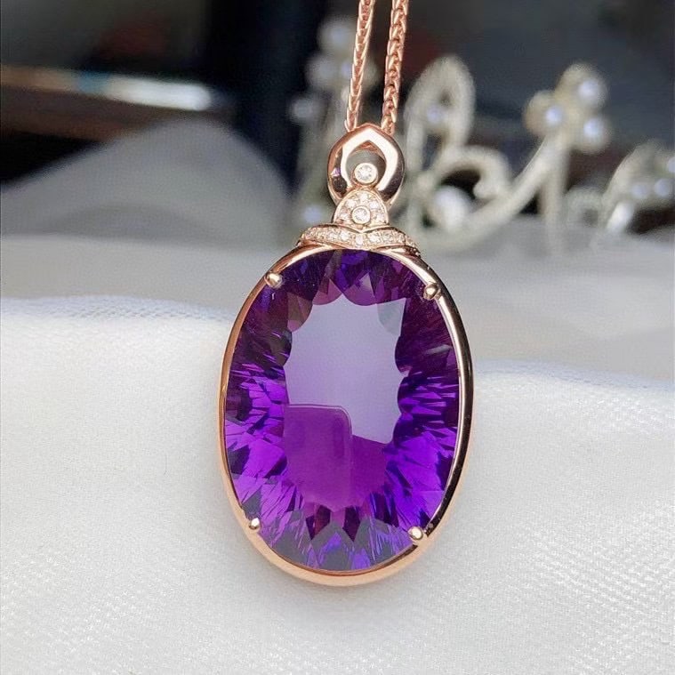 14k Gold 19.20 Ct Natural Amethyst & Diamond Pendant( Without Chain ): Ref:231034293 // gold content:14k gold // main gemstone:amethyst // shape:oval // carat weight:19. 20ct // color:purple // treatment:natural // // adjacent gemstone 2 : diamond // number of stones:16