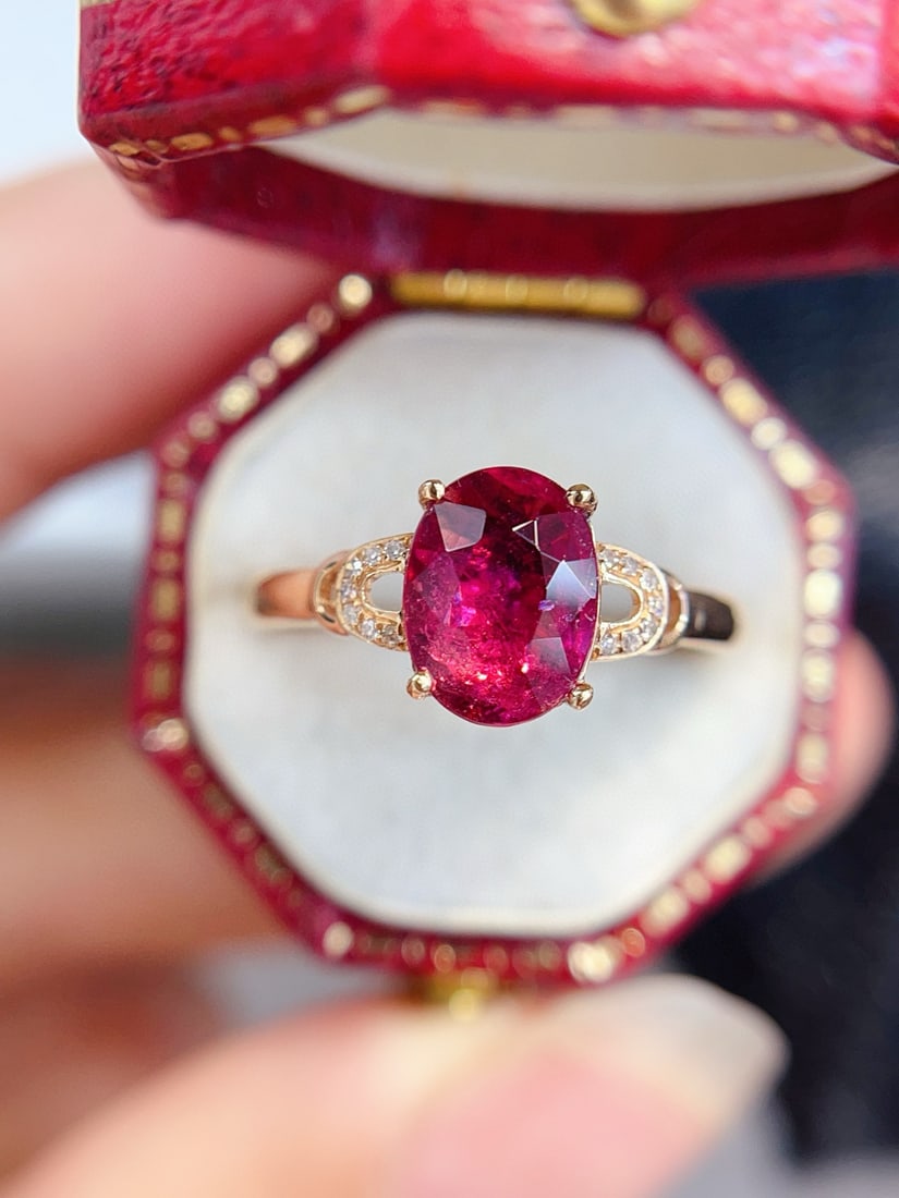 14k Gold 1.50 Ct Natural Tourmaline & Diamond Ring: Ref:231034299 // gold content:14k gold // ring size:7. 25us // // main gemstone:tourmaline // shape:oval // carat weight:1. 50ct // color:red // treatment:natural // // adjacent gemstone 2 : diamond