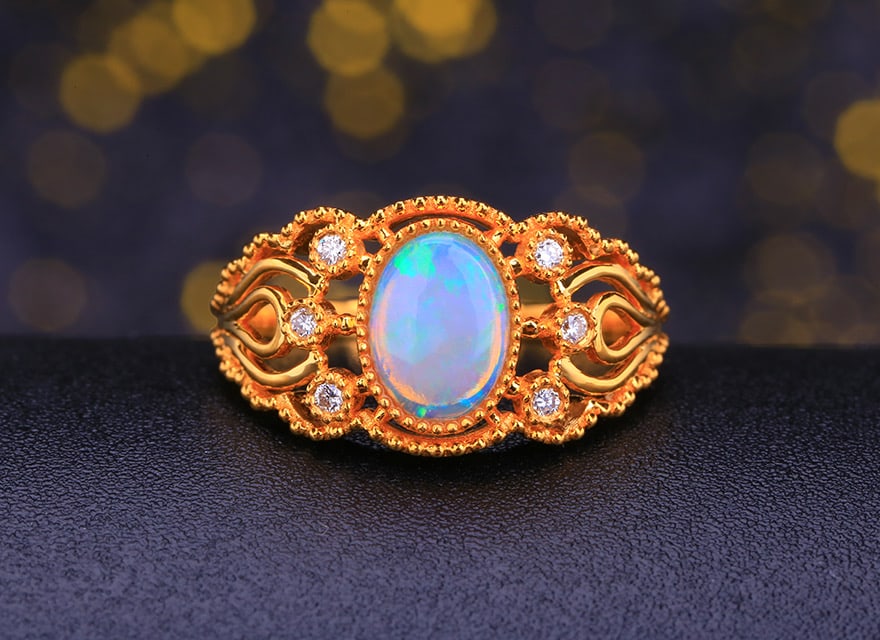 14k Gold 0.90 Ctw Natural Opal & Diamond Ring: Ref:231034313 // gold content:14k gold // ring size:7. 25us // // main gemstone:opal // shape:oval // carat weight:0. 84ct // color:color // treatment:natural // // adjacent gemstone 2 : diamond //