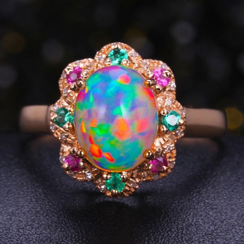 14k Gold 1.65 Ctw Natural Opal & Diamond Ring: Ref:231034314 // gold content:14k gold // ring size:7. 25us // // main gemstone:opal // shape:oval // carat weight:1. 58ct // color:color // treatment:natural // // adjacent gemstone 2 : diamond //