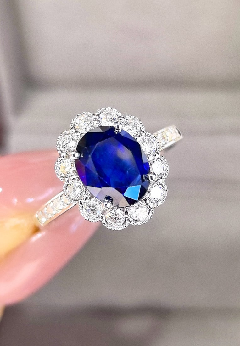 14k Gold 2.89 Ctw Natural Sapphire & Diamond Ring: Ref:231034322 // gold content:14k gold // ring size:7. 25us // // main gemstone:sapphire // shape:oval // carat weight:2. 44ct // color:royal blue // treatment:natural // // adjacent gemstone 2 :