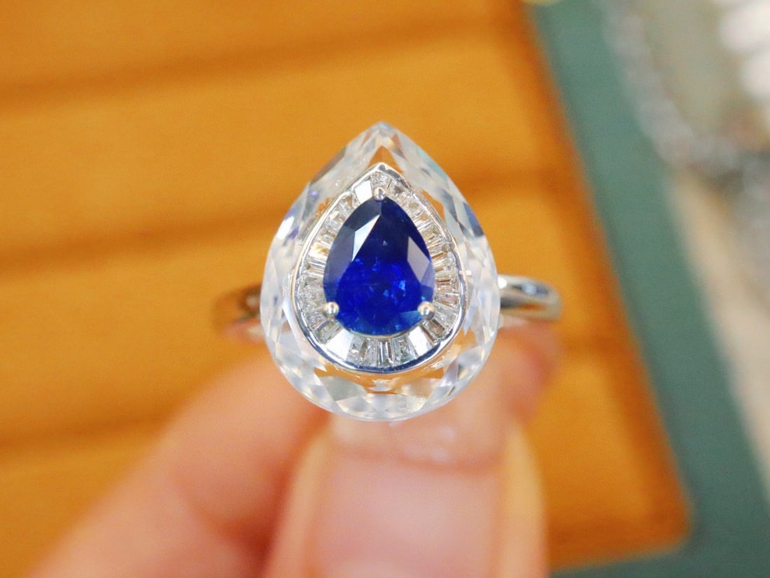 14k Gold 1.00 Ctw Natural Sapphire & Diamond Ring: Ref:231034325 // gold content:14k gold // ring size:7. 25us // // main gemstone:sapphire // shape:pear // carat weight:0. 85ct // color:royal blue // treatment:natural // // adjacent gemstone 2 :