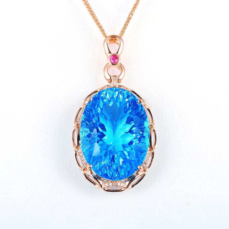 14k Gold 33.63 Ct Natural Topaz & Diamond & Ruby Pendant( Without Chain ): Ref:231034333 // gold content:14k gold // main gemstone:topaz // shape:oval // carat weight:33. 63ct // color:blue // treatment:natural // // adjacent gemstone 2 : diamond // shape:round // clarity