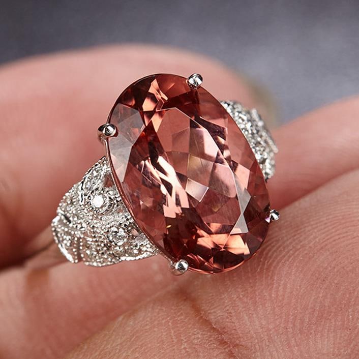 14k Gold 6.6 Ct Natural Tourmaline & Diamond Ring: Ref:231034343 // gold content:14k gold // ring size:7. 25us // // main gemstone:tourmaline // shape:oval // carat weight:6. 6ct // color:red // treatment:natural // // adjacent gemstone 2 : diamond