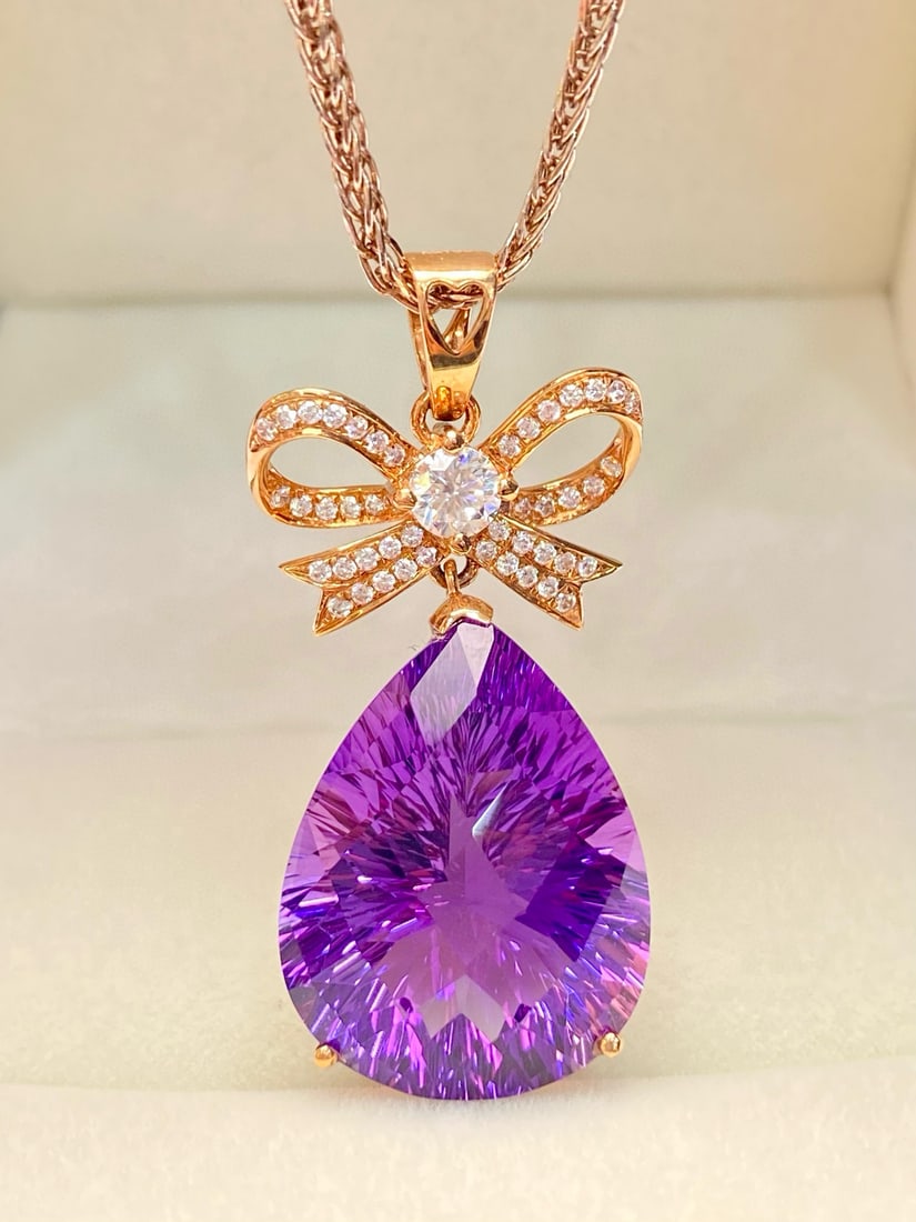 14k Gold 17.9 Ct Natural Amethyst & Zircon Pendant( Without Chain ): Ref:231034351 // gold content:14k gold // main gemstone:amethyst // shape:pear // carat weight:17. 9ct // color:purple // treatment:natural // // adjacent gemstone 2 : zircon // number of stones:45
