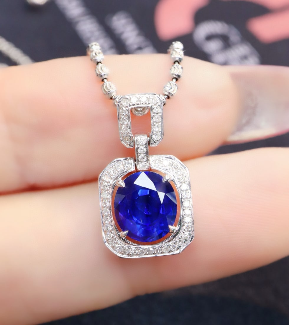 14k Gold 1.71 Ctw Natural Sapphire & Diamond Pendant( Without Chain ): Ref:231034386 // gold content:14k gold // main gemstone:sapphire // shape:oval // carat weight:1. 56ct // color:royal blue // treatment:natural // // adjacent gemstone 2 : diamond // shape:round //