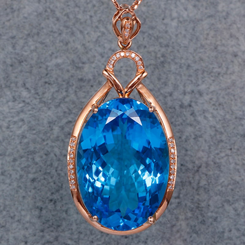 14k Gold 25.07 Ctw Natural Topaz & Diamond Pendant( Without Chain ): Ref:231034404 // gold content:14k gold // main gemstone:topaz // shape:oval // carat weight:24. 97ct // color:blue // treatment:natural // // adjacent gemstone 2 : diamond // shape:round // carat weig