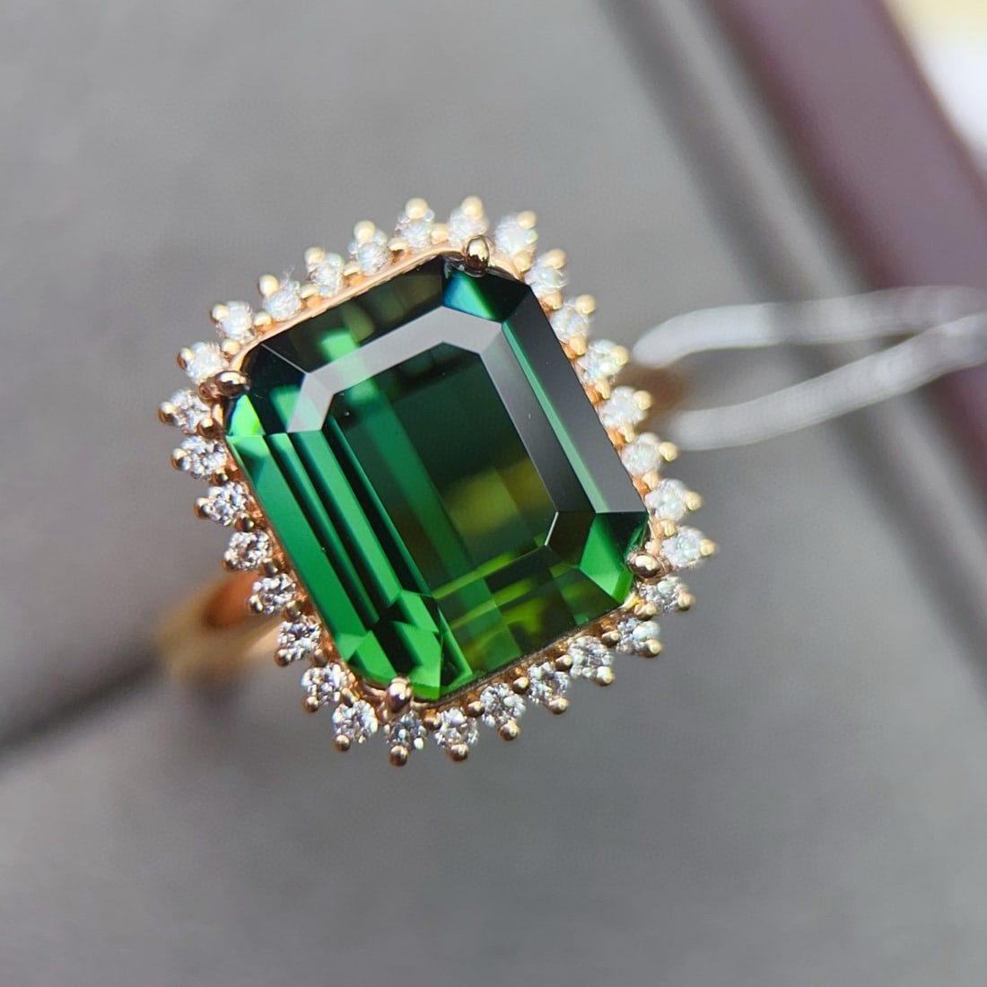 14k Gold 5.35 Ctw Natural Tourmaline & Diamond Ring: Ref:231034412 // gold content:14k gold // ring size:7. 25us // // main gemstone:tourmaline // shape:octagonal // carat weight:5. 05ct // color:green // treatment:natural // // adjacent gemstone 2 :
