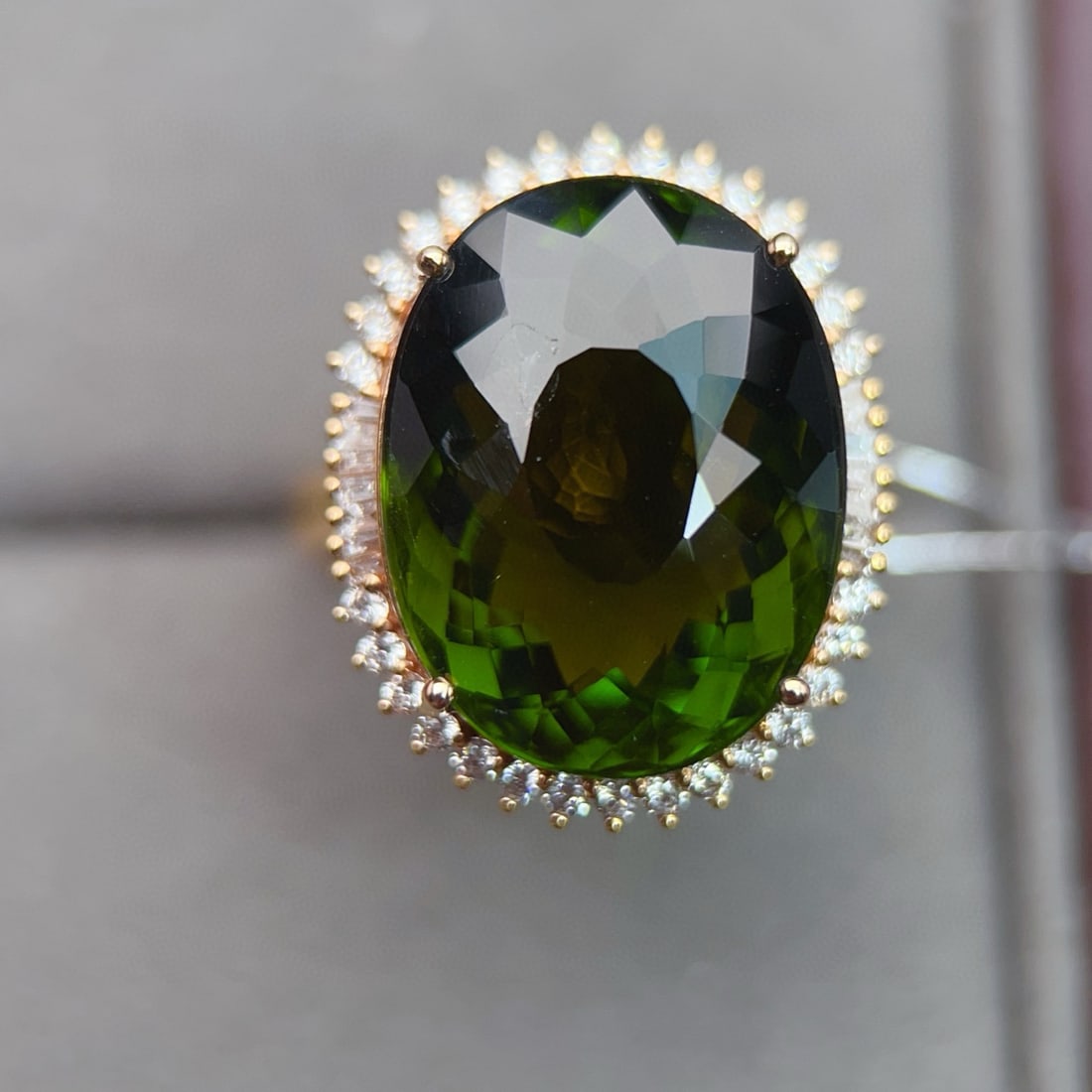 14k Gold 15.44 Ctw Natural Tourmaline & Diamond Ring: Ref:231034413 // gold content:14k gold // ring size:7. 25us // // main gemstone:tourmaline // shape:oval // carat weight:14. 3ct // color:green // treatment:natural // // adjacent gemstone 2 :