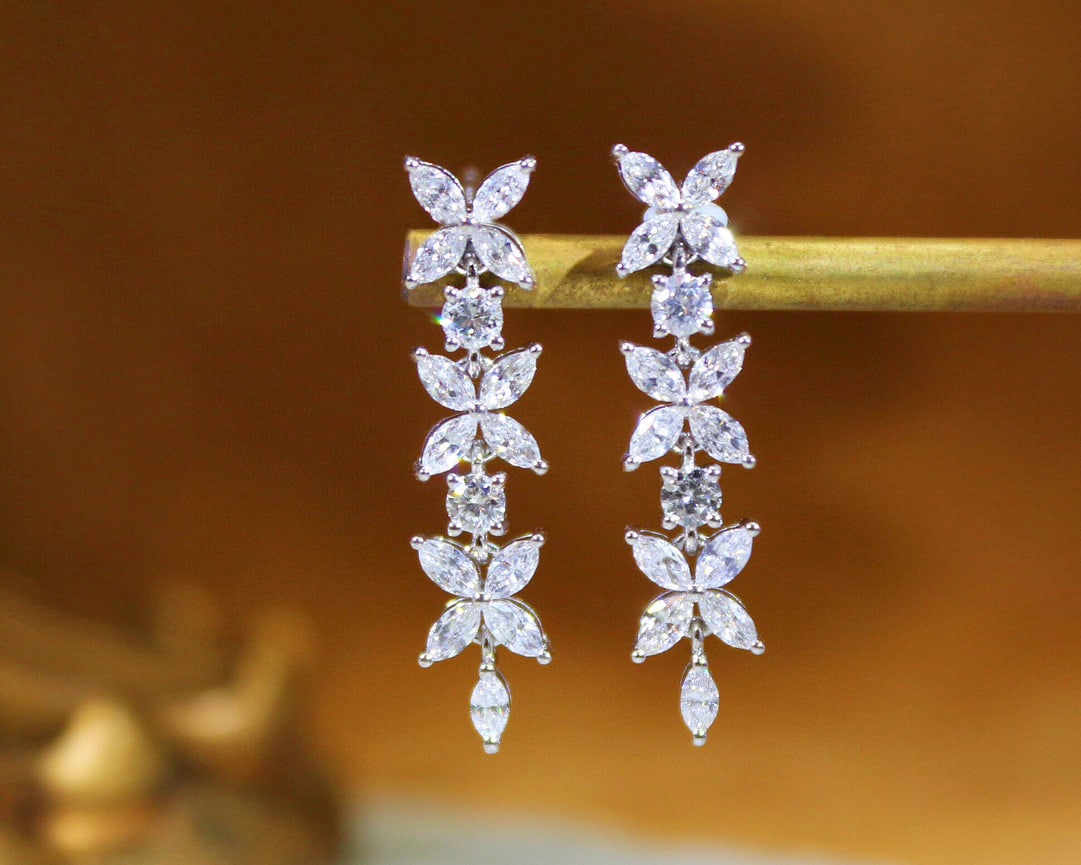 14k Gold 1 Ct Natural H Diamond Earrings: Ref:231034422 // gold content:14k gold // main gemstone:diamond // shape:multiply // carat weight:1ct // clarity grade:vs-si // color:h // treatment:natural // Condition: New Low Estimate: 5100.00 Hig