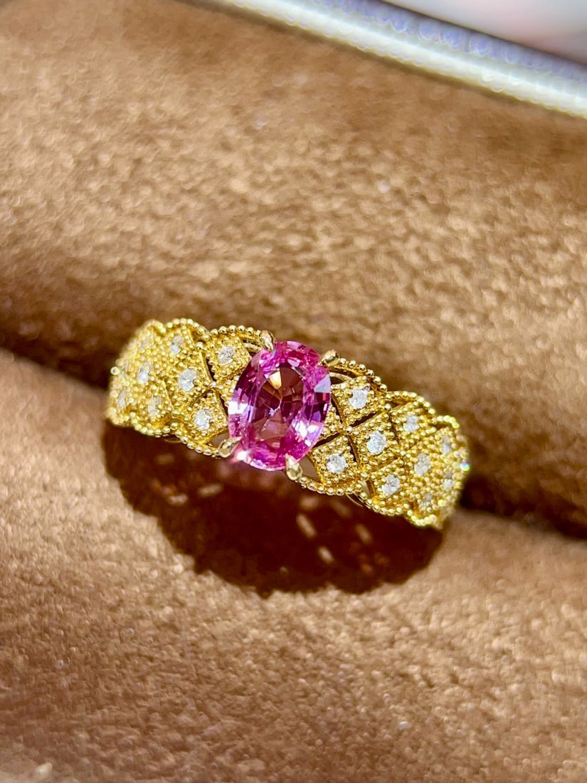 14k Gold 1.08 Ctw Natural Padparadscha Sapphire & Diamond Ring: Ref:231034427 // gold content:14k gold // ring size:7. 25us // // main gemstone:padparadscha sapphire // shape:oval // carat weight:0. 97ct // color:orangish pink // treatment:natural // // adjacent g