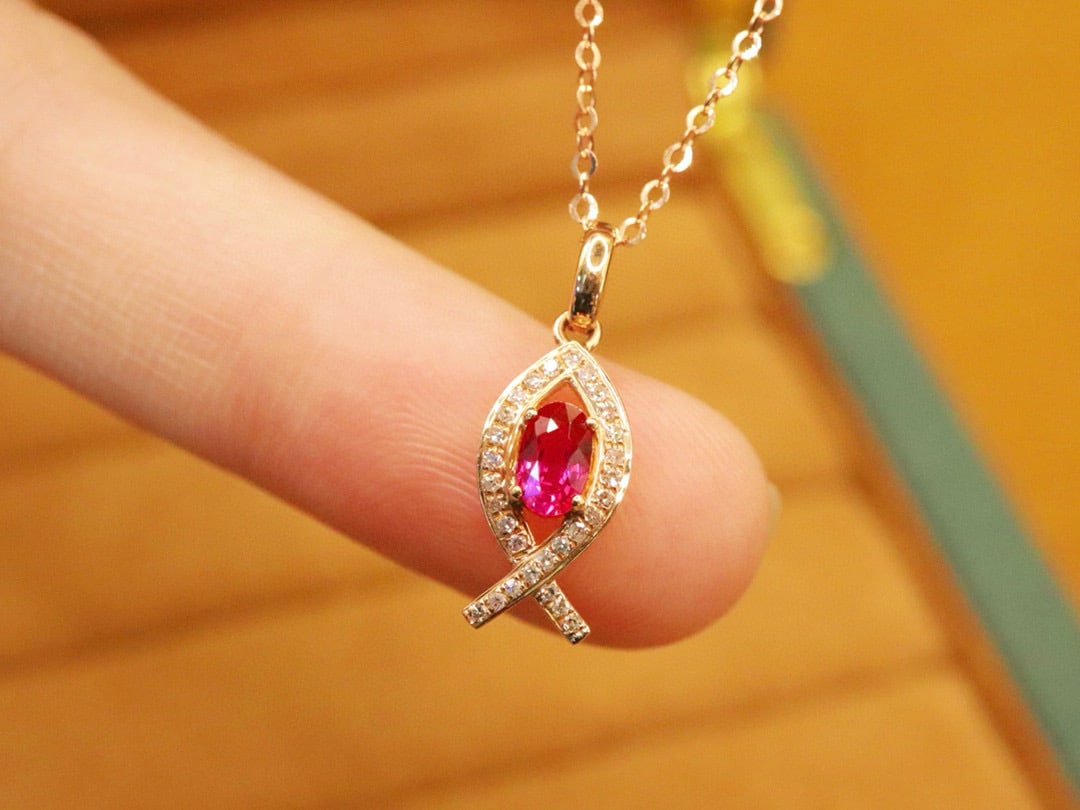 14k Gold 0.44 Ctw Natural Ruby & Diamond Pendant( Without Chain ): Ref:231034430 // gold content:14k gold // main gemstone:ruby // shape:oval // carat weight:0. 36ct // color:red // treatment:natural // // adjacent gemstone 2 : diamond // number of stones:29 //