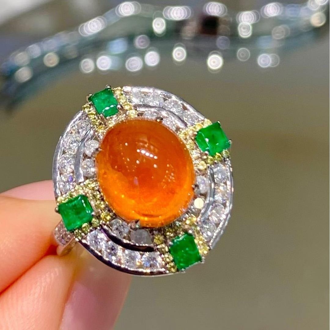 14k Gold 6.28 Ct Natural Spessartine & Diamond Ring: Ref:231035030 // gold content:14k gold // ring size:7. 25us // // main gemstone:spessartine // shape:oval // carat weight:6. 28ct // color:orange // treatment:natural // // adjacent gemstone 2 :