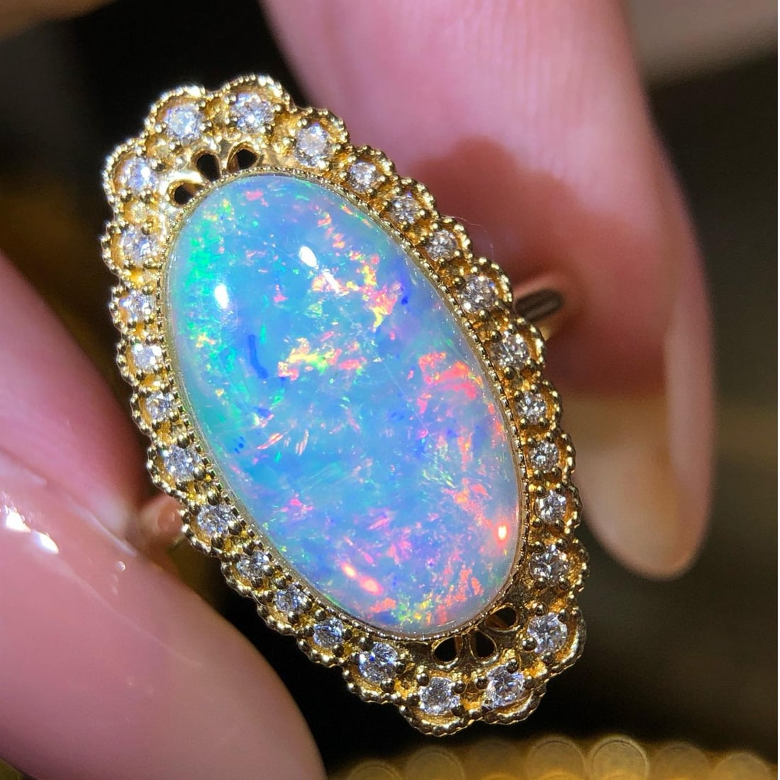 14k Gold 3.94 Ctw Natural Opal & Diamond Ring: Ref:231035051 // gold content:14k gold // ring size:7. 25us // // main gemstone:opal // shape:oval // carat weight:3. 64ct // color:color // treatment:natural // // adjacent gemstone 2 : diamond // sh