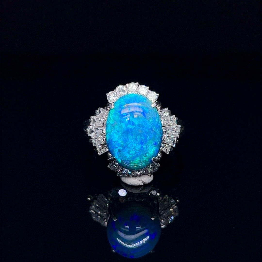 14k Gold 5.14 Ctw Natural Opal & Diamond Ring: Ref:231035053 // gold content:14k gold // ring size:7. 25us // // main gemstone:opal // shape:oval // carat weight:4. 32ct // color:blue // treatment:natural // // adjacent gemstone 2 : diamond //
