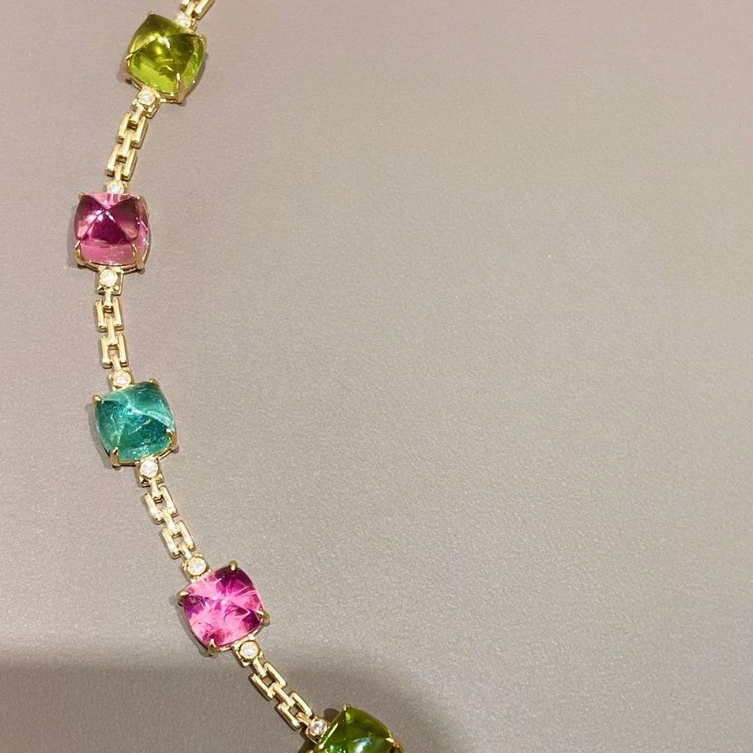 14k Gold 17.2 Ct Natural Tourmaline & Diamond Bracelet: Ref:231035127 // gold content:14k gold // main gemstone:tourmaline // shape:suger-loaf // carat weight:17. 2ct // color:color // treatment:natural // // adjacent gemstone 2 : diamond // shape:round